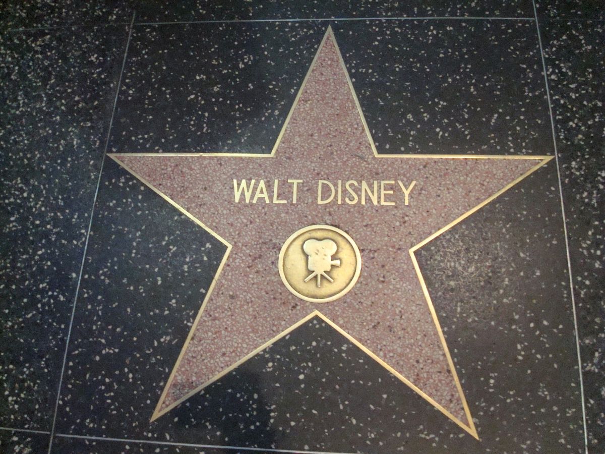 A star on the Hollywood Walk of Fame with the name Walt Disney and a symbol representing the film industry is shown.